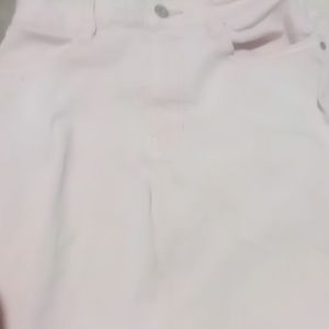 A baby pink jean skirt